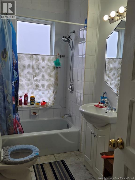 607-609 Ready, Saint John, New Brunswick E2M 3S4 - Photo 9 - NB129524