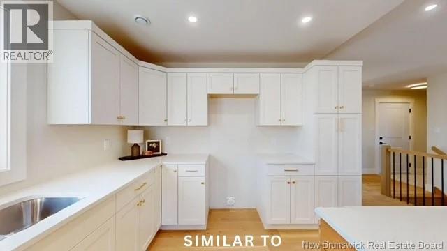 22 Wetmore Boulevard Unit# 13, Quispamsis, New Brunswick  E2E 0Y9 - Photo 11 - NB139301