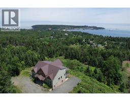 <div class="price">$899,900</div> 60 Ohio Pond Road<br>Grand Manan, New Brunswick<br><div class='bed_bath'>4 Bed | 3 Bath</div> Grand Manan Island Property 30134909 Photo 1